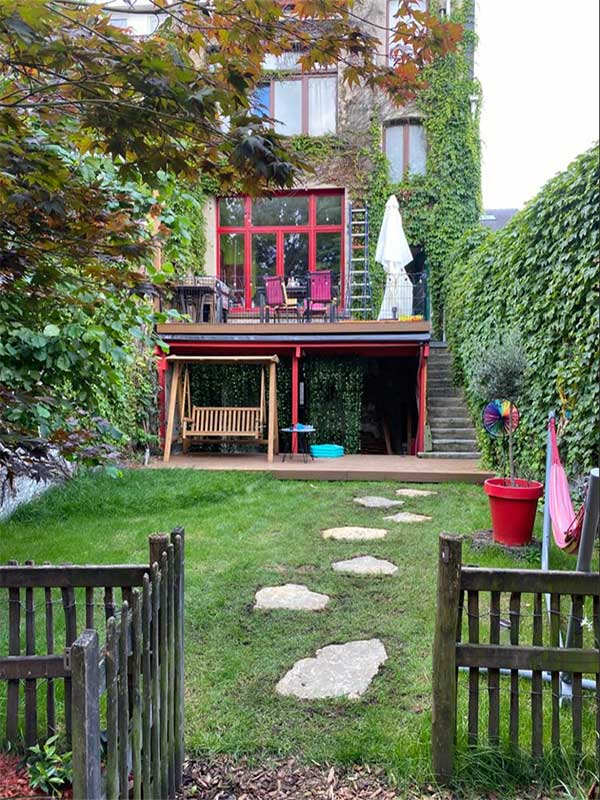 Jardin paysager moderne à Laeken – Cita Verdi Création d’un jardin contemporain et verdoyant à Laken par Cita Verdi, mélange de graminées, arbustes et massifs fleuris.